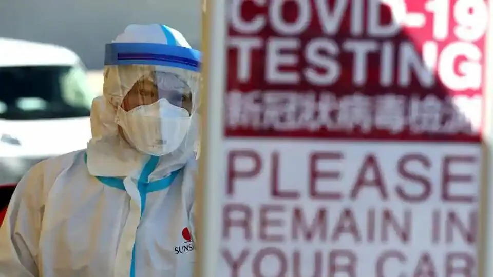 A medical professional waits to administer a coronavirus (COVID-19) test during a drive-thru testing station on March 26, 2020 in Daly City, California.