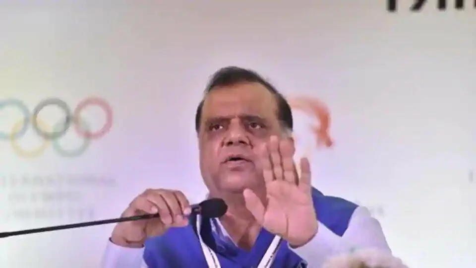 President of the Indian Olympic Association (IOA) Dr. Narinder Dhruv Batra ( L) addresses a press conference.