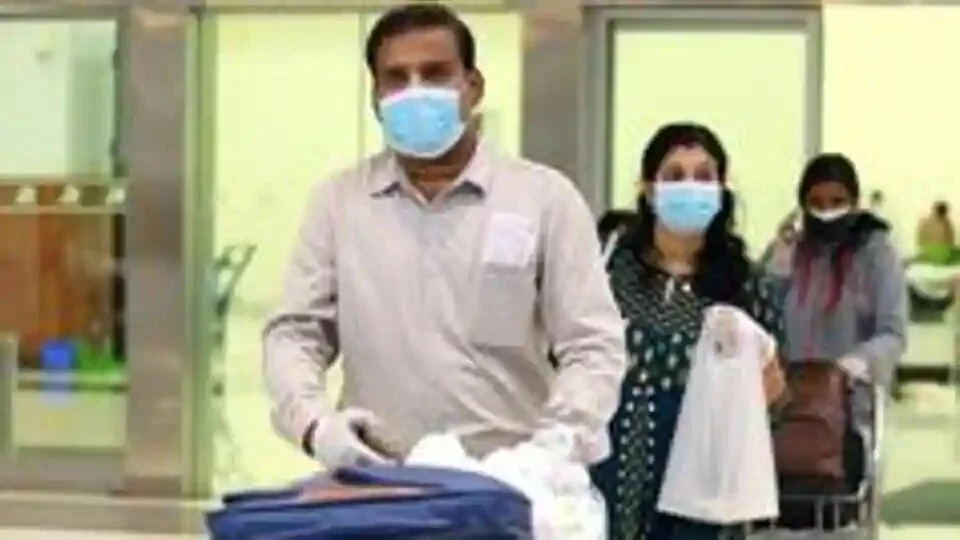 Stranded passangers check out from the Kochi International Airport after their arrival from Abu Dhabi by special Air India Express flight in Kochi