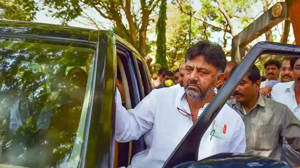 Karnataka Pradesh Congress Committee (KPCC) President DK Shivakumar leaves after a meeting with state DGP Praveen Sood (unseen), in Bengaluru. (PTI)