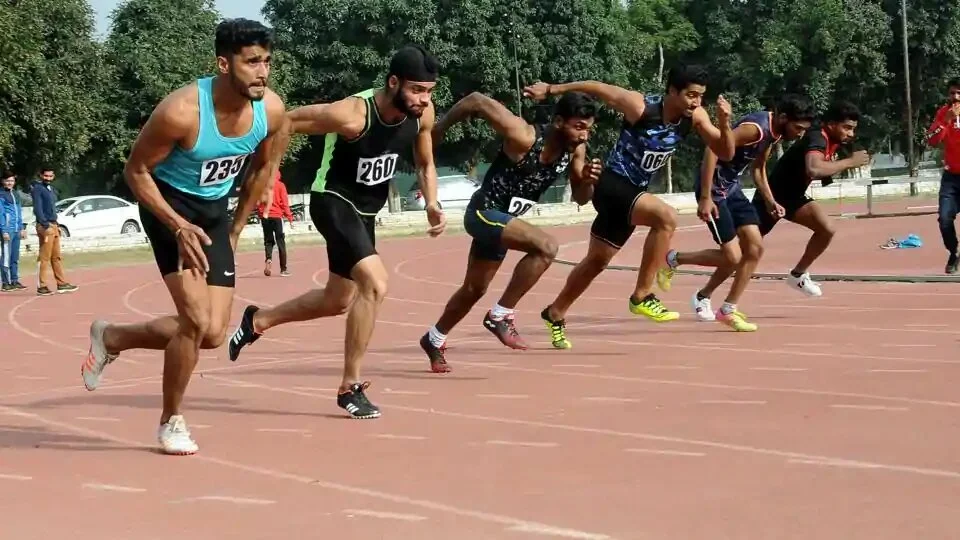 Athletes in action during the men Under -25 Punjab State Games organized by Sports Department Punjab at Polo Ground in Patiala.