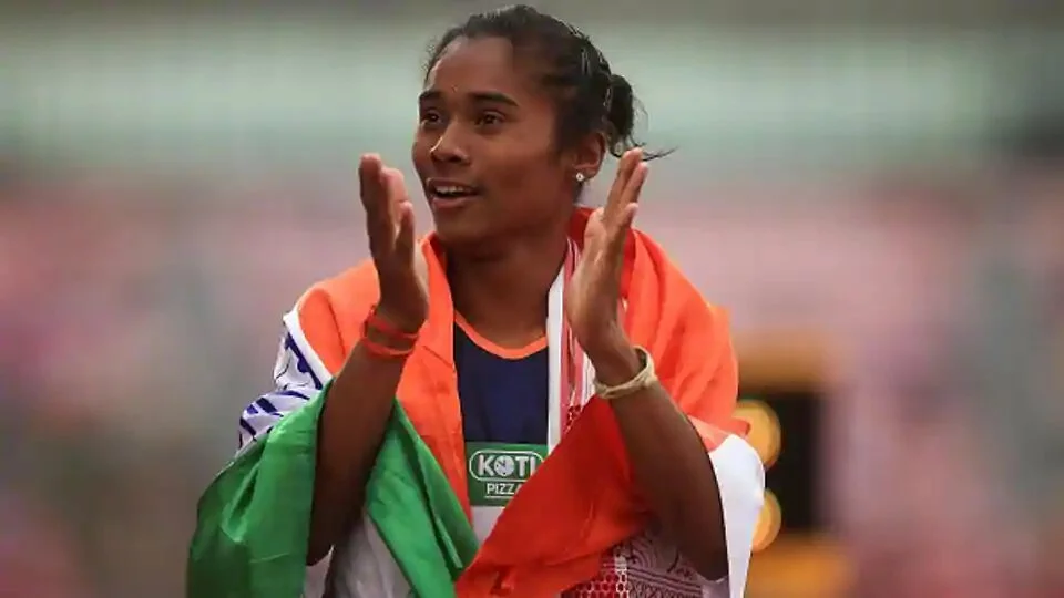 India’s Hima Das celebrates after winning gold in the final of the women
