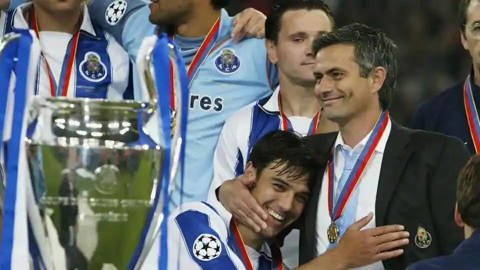 Nuno Valente of FC Porto hugs his manager Jose Dos Santos Mourinho after winning the Champions League during the UEFA Champions League Final match between AS Monaco and FC Porto at the AufSchake Arena on May 26, 2004 in Gelsenkirchen, Germany.