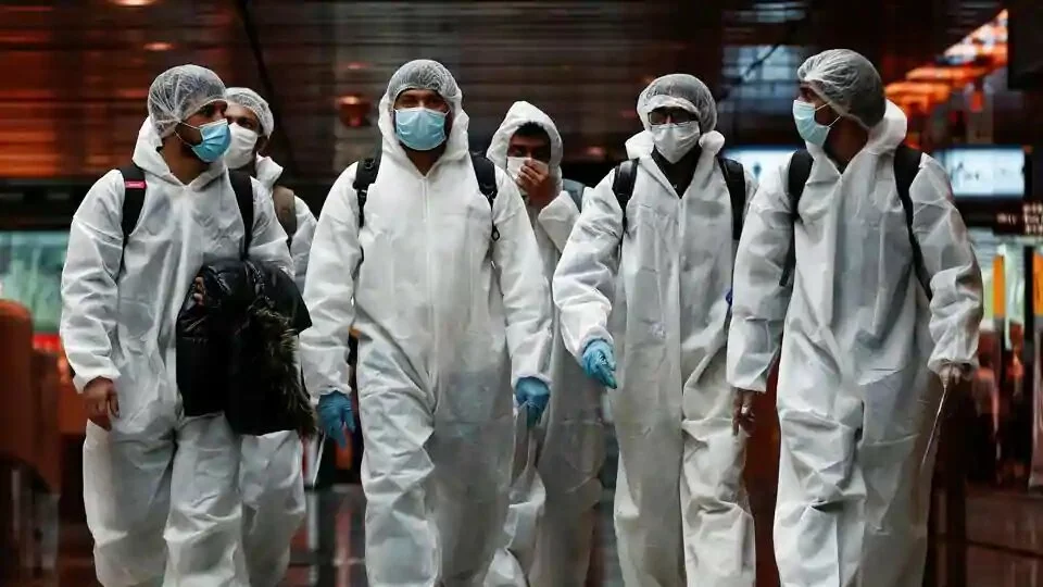 Seafarers who have spent the past months working onboard vessels arrive at the Changi Airport to board their flight back home to India during a crew change amid the coronavirus disease (COVID-19) outbreak in Singapore June 12, 2020.