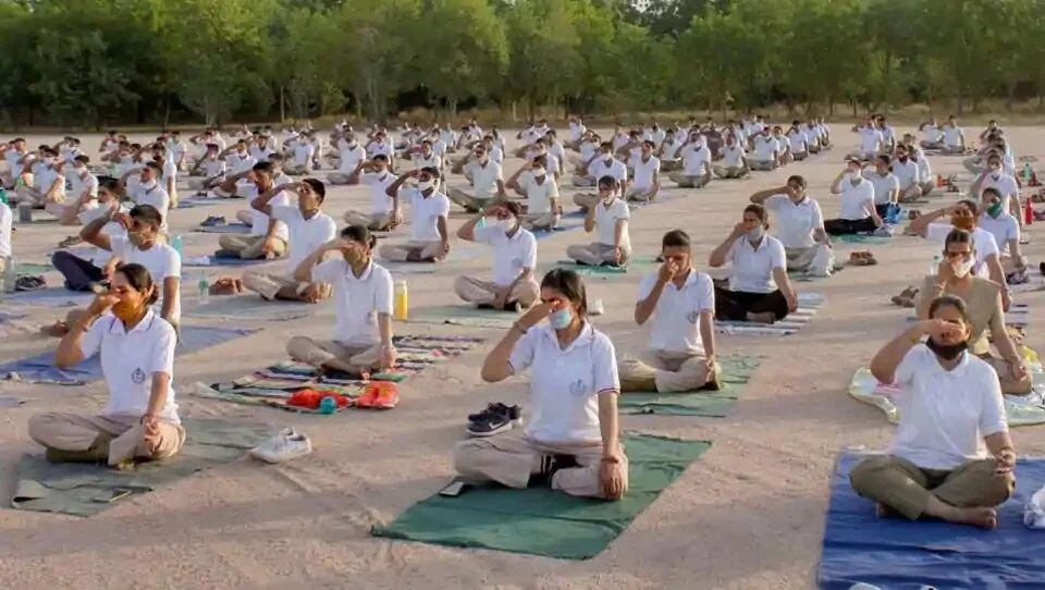 Bikaner: Police personnel practice yoga during the preparations ahead of International Yoga Day at police line parade ground, amid the ongoing COVID-19 lockdown, in Bikaner, Wednesday, June 17, 2020.