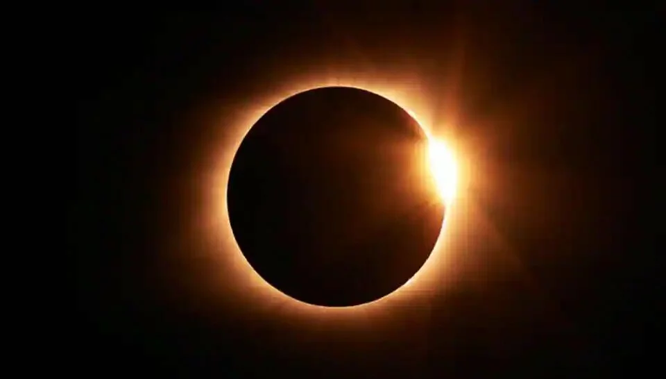 A solar eclipse, or Surya Grahan, is when the Earth gets engulfed in the shadow the the moon casts when it covers the sun, either fully or partially blocking sunlight.