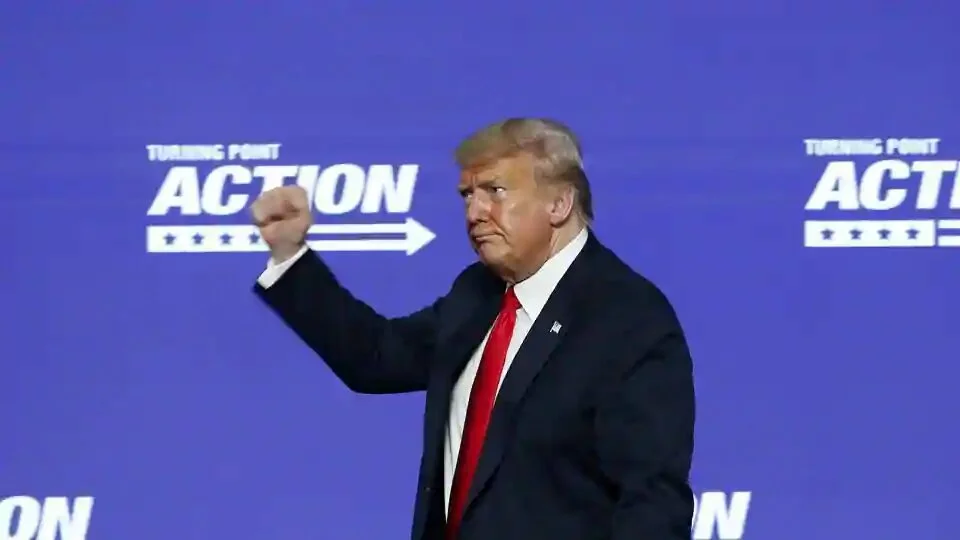 US President Donald Trump gives a fist pump to the crowd after addressing a gathering in Phoenix on Tuesday.